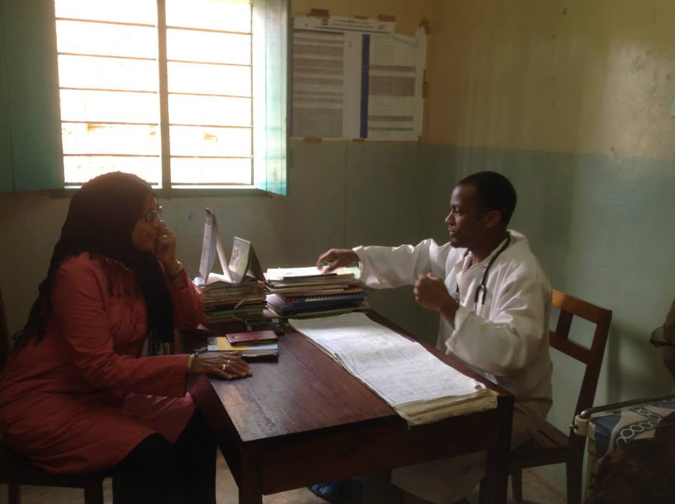 Reenactment of health provider seeing patient at Mchinga 1 dispensary